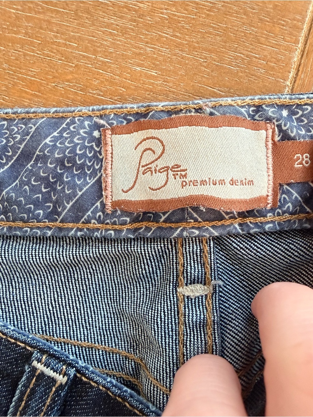 PAIGE denim jeans with patterned waistband and tan label
